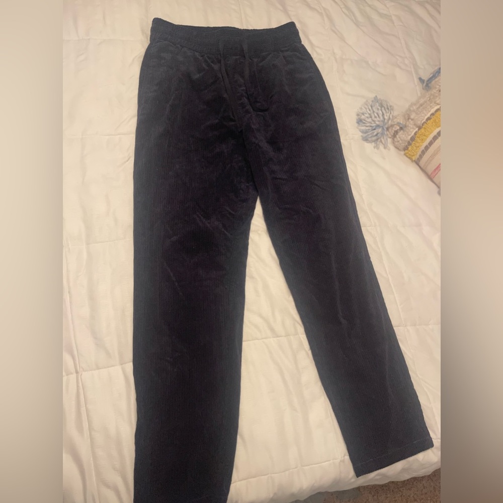 Navy blue corduroy pants barely worn. No stains or holes.